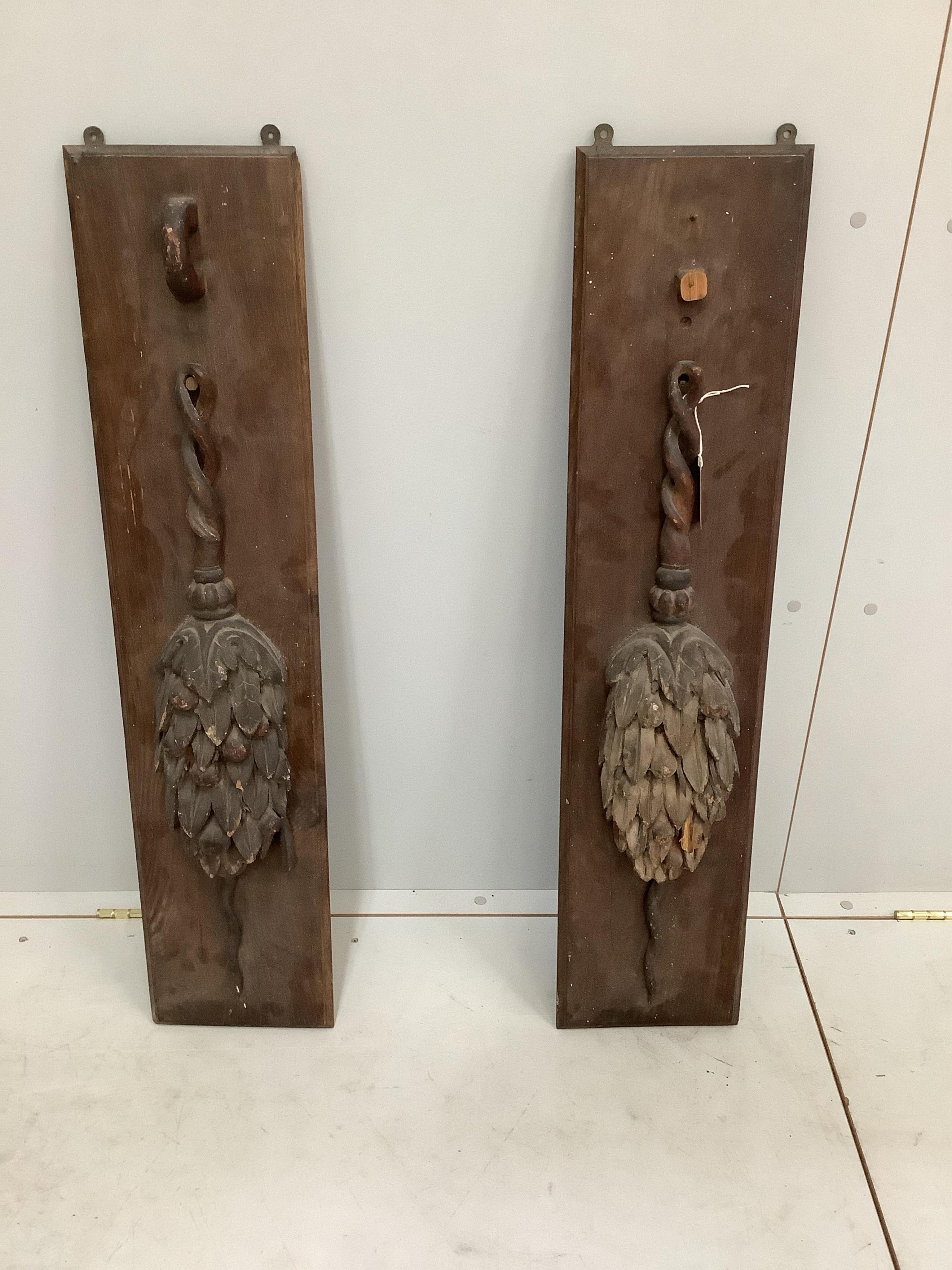 A pair of carved oak panels (a/f), width 22cm, height 99cm